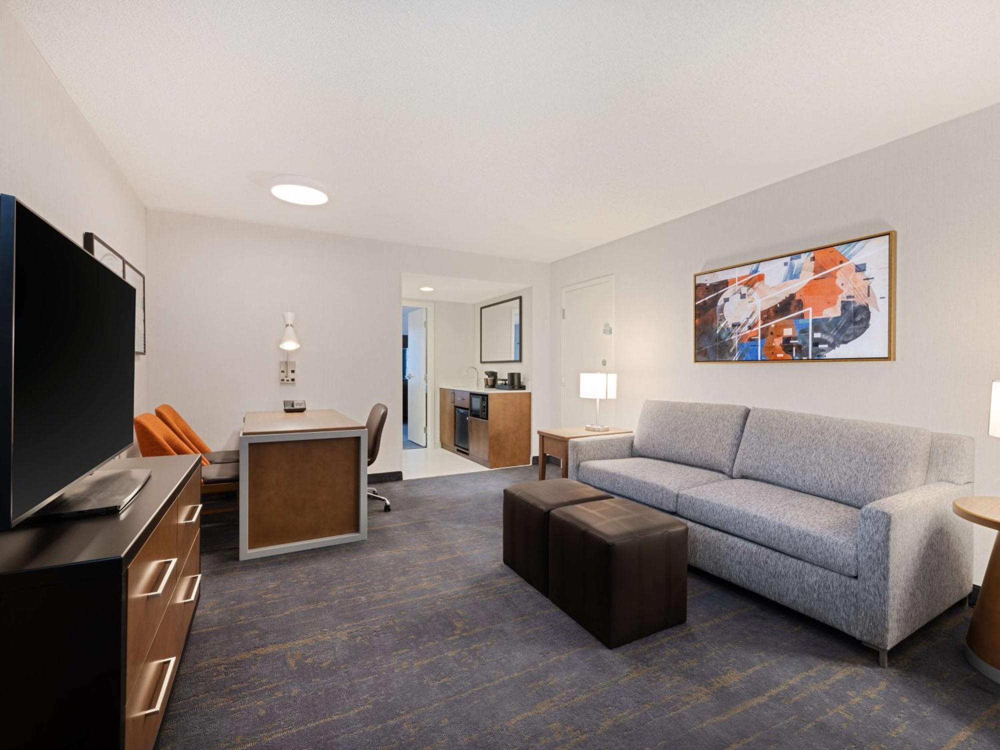 Two Room Corner Suite Two Double Beds Sofa bed City View – Non-Smoking